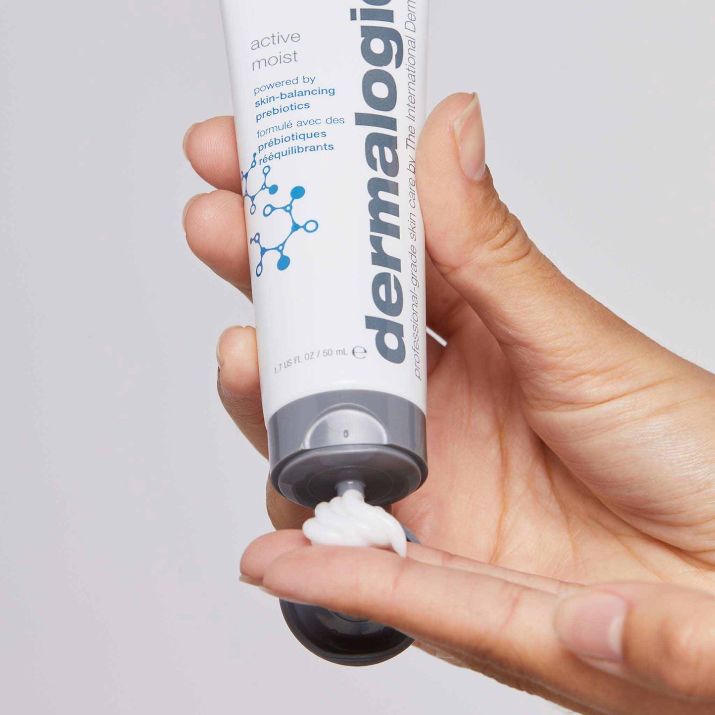 active moist being dispensed onto fingertips